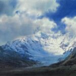 Snow peaks beneath rolling cloud. Watercolour, Jorge Corpuna.